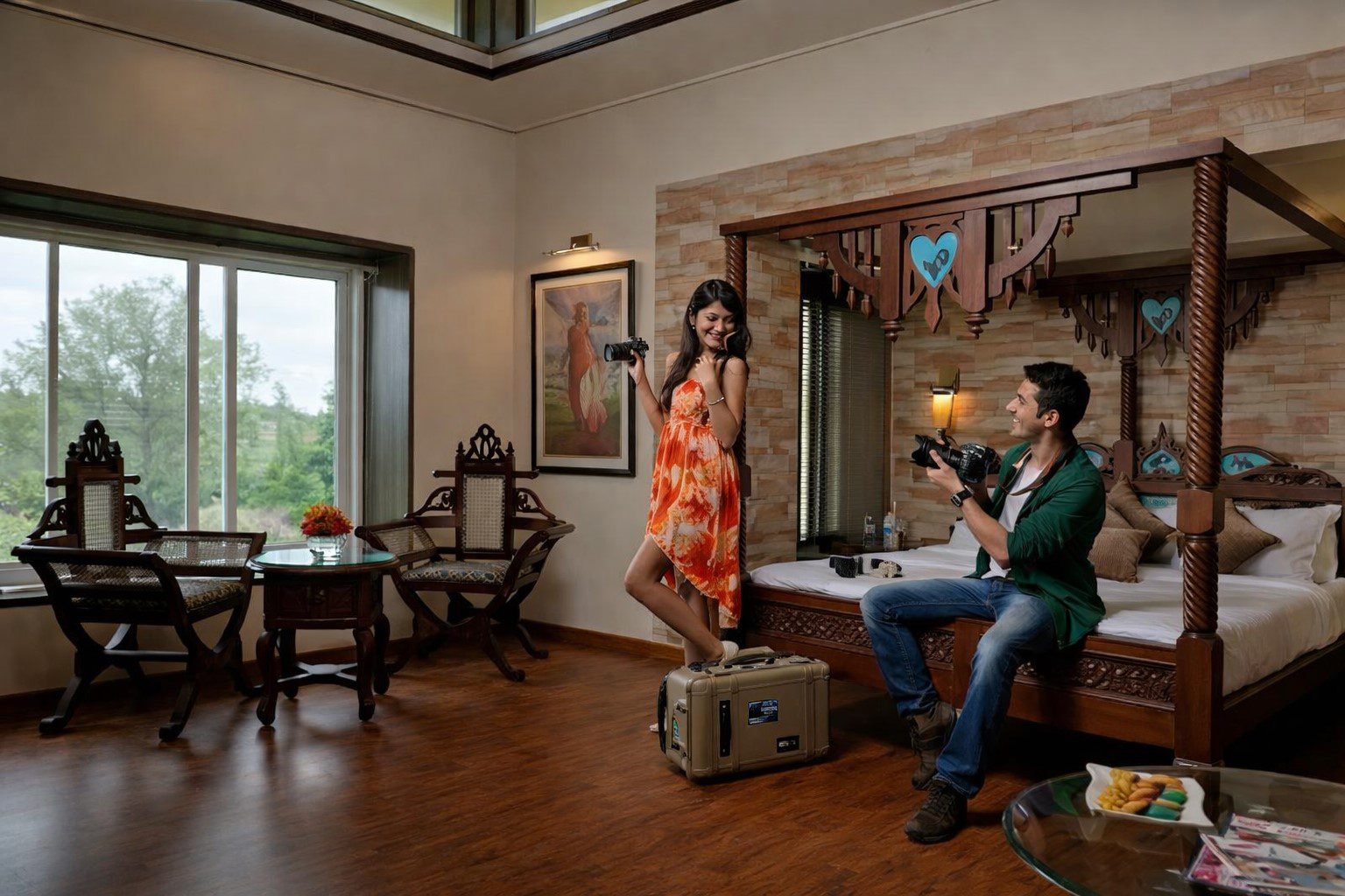 Couple Taking Photos at Neonz Resort's Theme Room